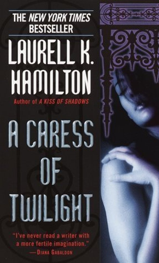 A Caress of Twilight by Laurell K. Hamilton book cover